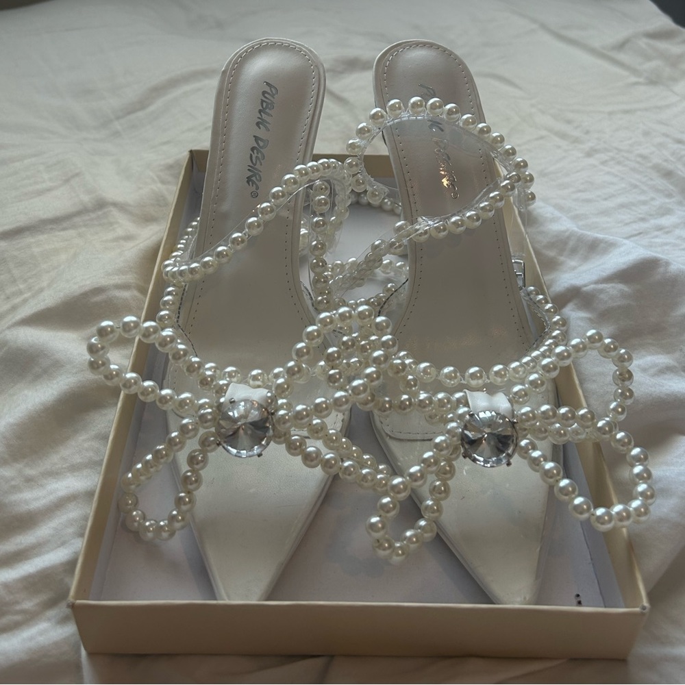 never worn before. Pearl diamond heels from public desire.